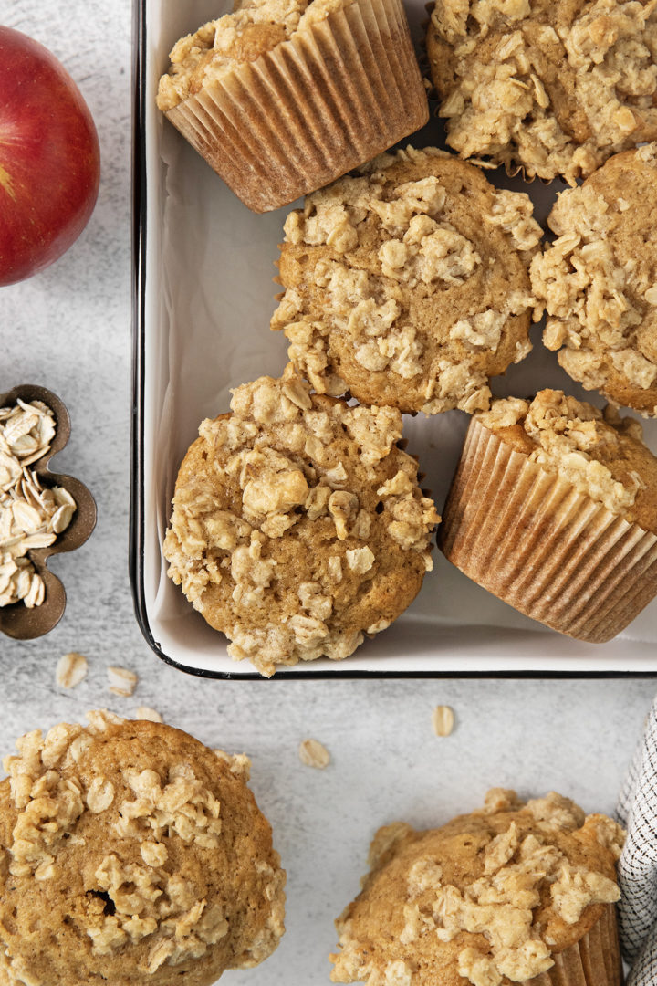 apple cider muffins in a baking pan