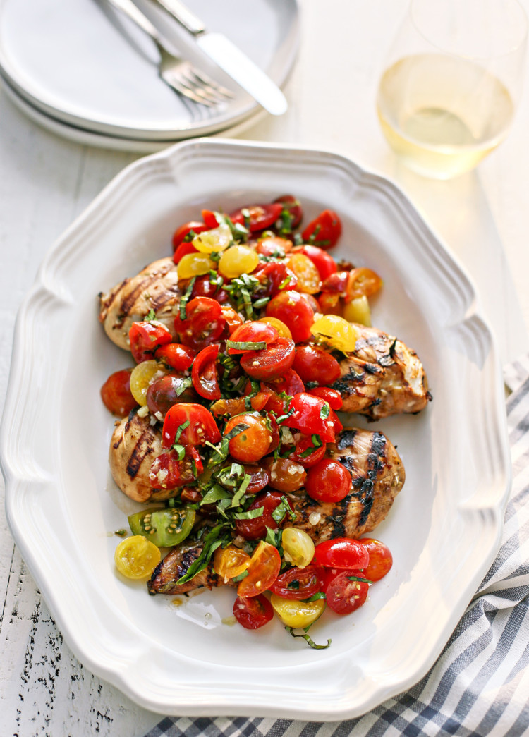 bruschetta chicken on a white platter