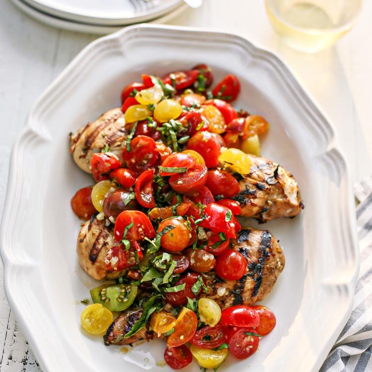 bruschetta chicken on a white platter