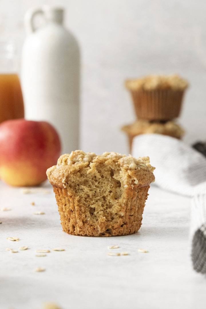 apple crumble muffin with a bite out of it