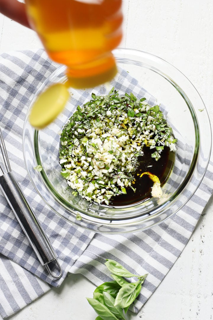 basil and balsamic vinegar in a glass bowl for grilled bruschetta chicken