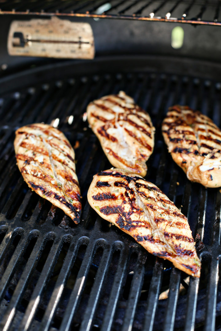balsamic chicken cooking on a grill