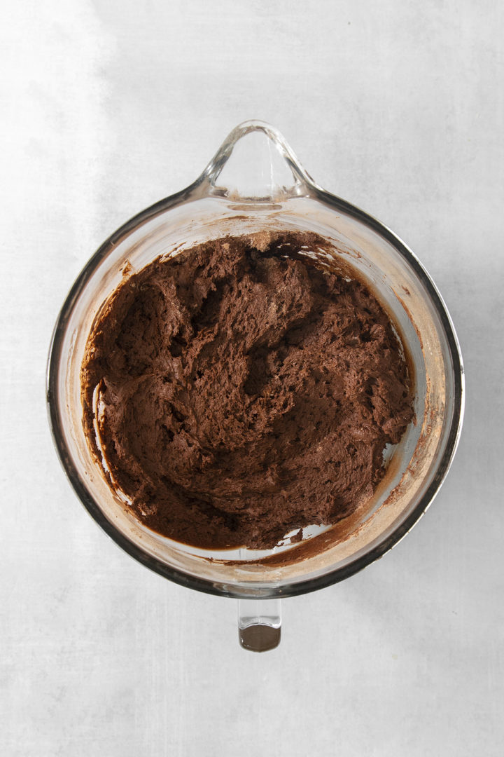 chocolate pumpkin cupcake batter in a glass bowl