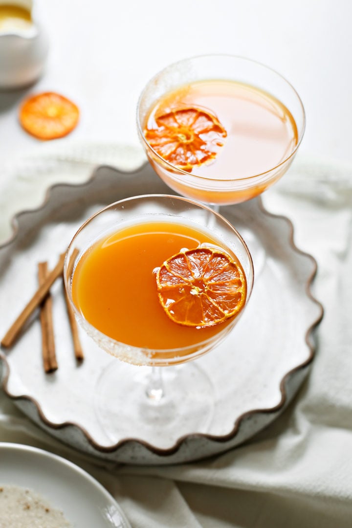 two pumpkin martinis on a serving tray