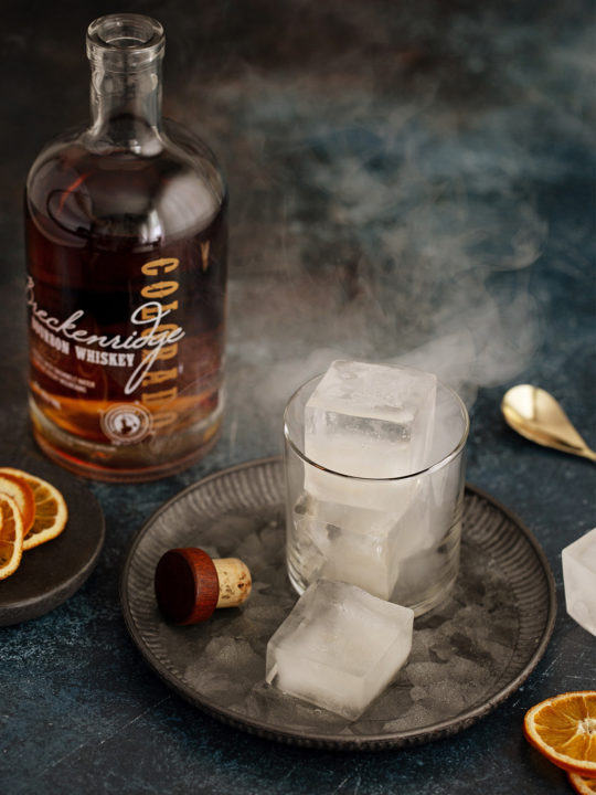 Glass of bourbon over smoked ice cubes garnished with smoked oranges. It's  1700 somewhere : r/Traeger