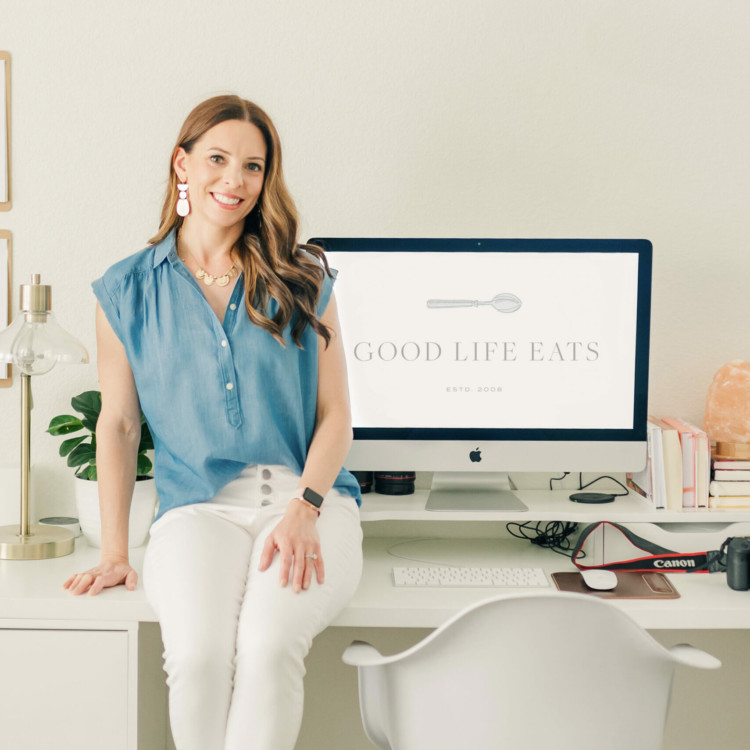photo of Katie from Good Life Eats next to a computer