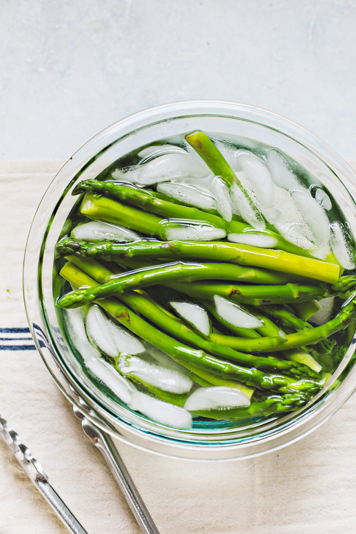 blanched asparagus in ice bath