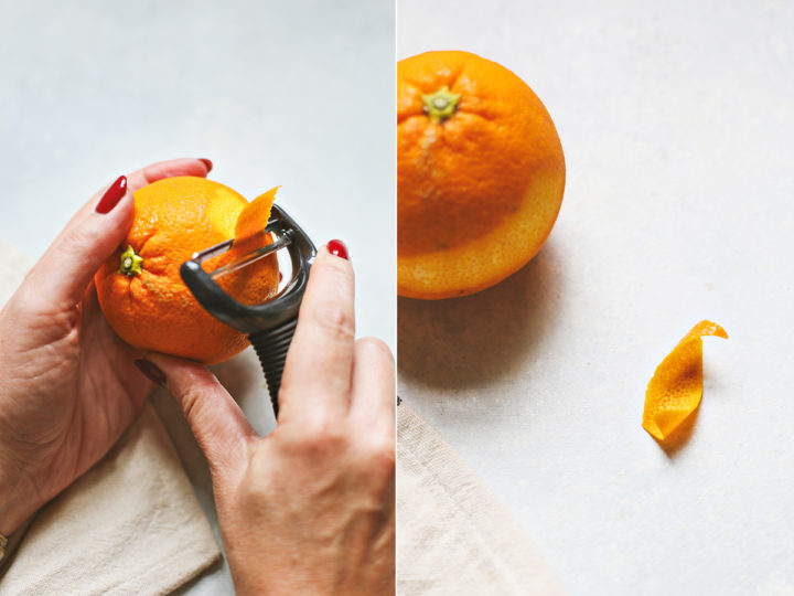 woman demonstrating how to make an orange swath orange peel garnish