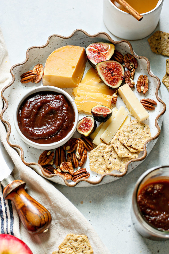 charcuterie board with a bowl of homemade apple butter