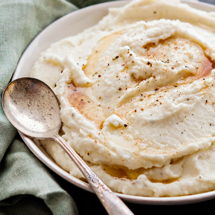 a bowl of parmesan mashed potatoes