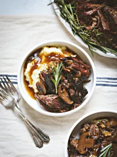bowl of mashed potatoes with instant pot chuck roast
