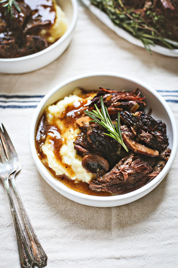plate with mashed potatoes and red wine instant pot chuck roast with mushroom gravy