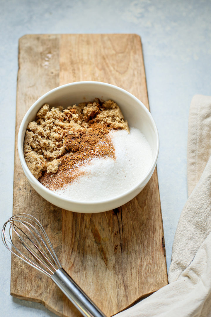 a bowl of brown sugar, granulated sugar, and spices for apple butter