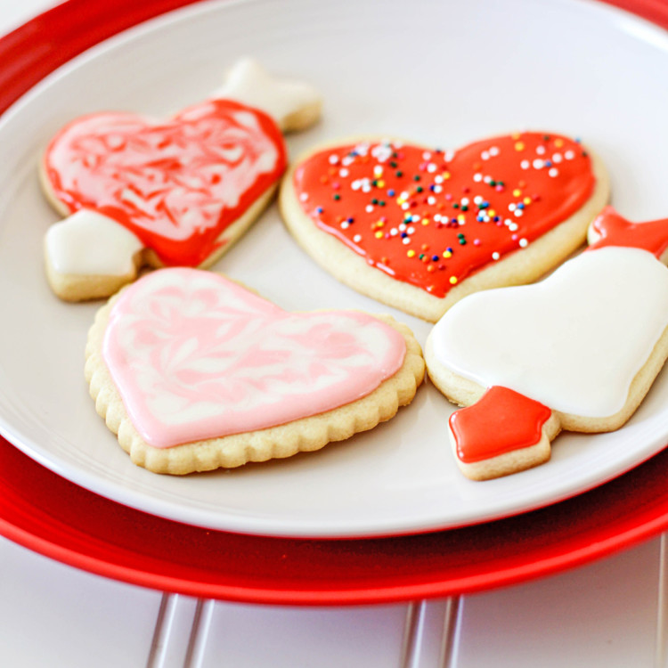 valentine cut out cookie hearts on a plate
