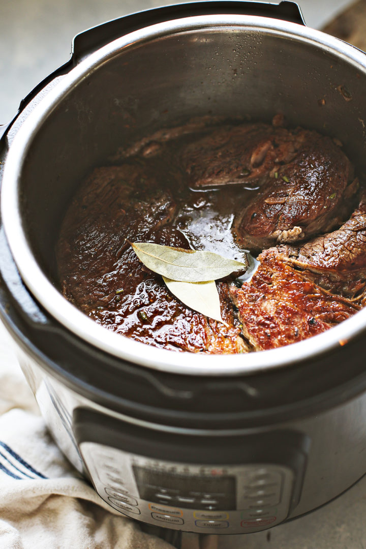 adding the chuck roast in Instant Pot 
