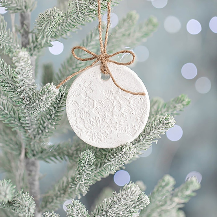 salt dough ornament hanging on a christmas tree