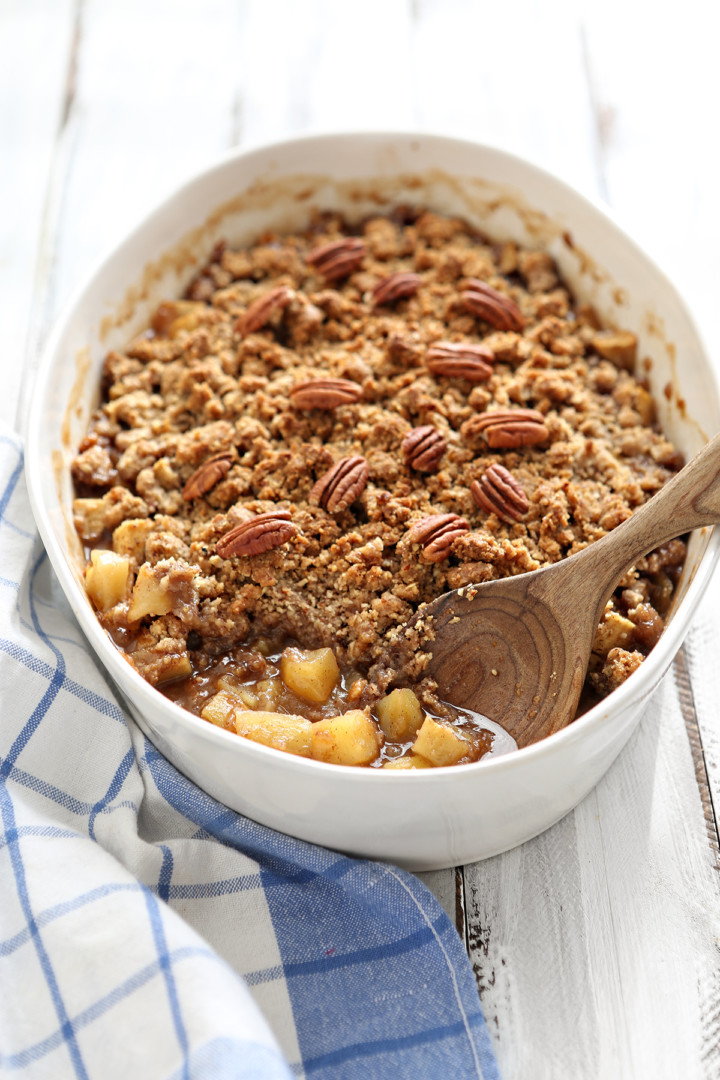 Apple Crisp with Oatmeal Crumble Topping in a white baking dish