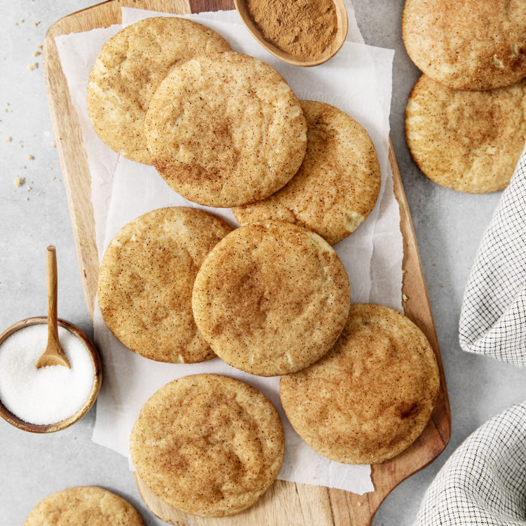 overhead photo of brown butter Snickerdoodles on a wooden cutting board