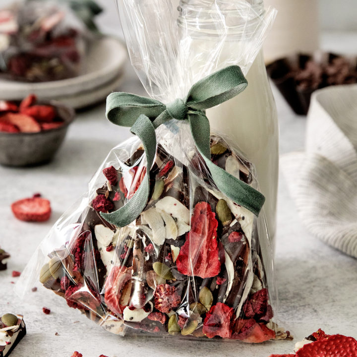 dark chocolate fruit and nut in a gift bag with green velvet bow