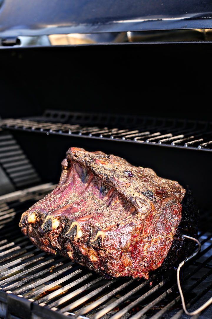 smoked prime rib on a traeger with a probe thermometer 