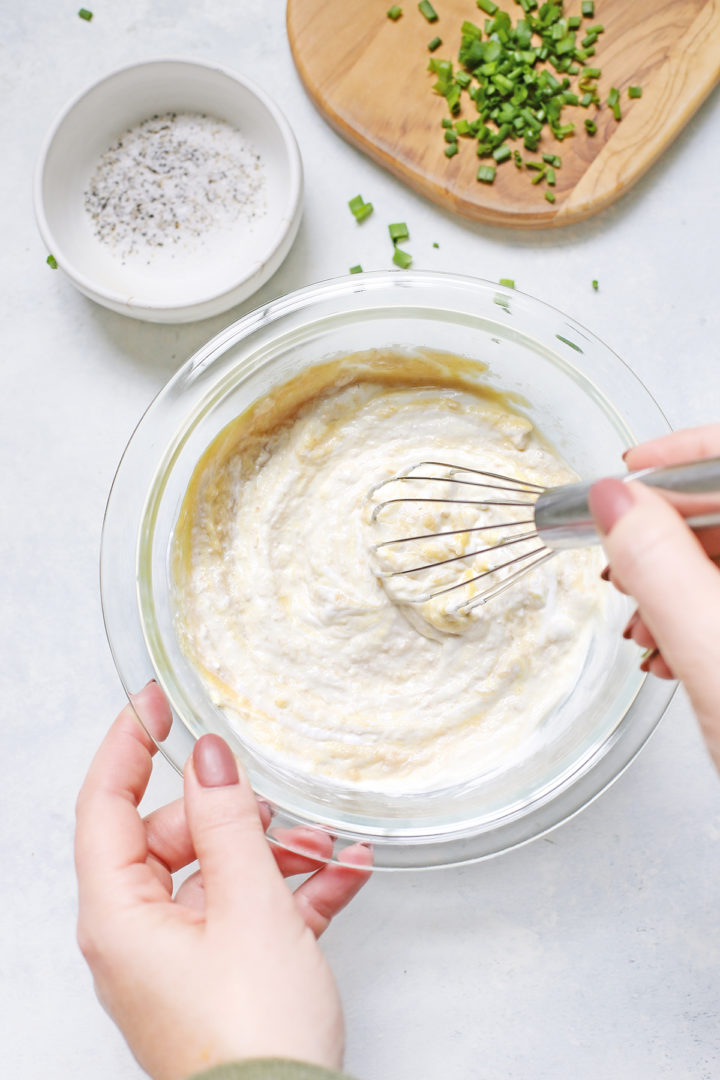 woman showing how to make horseradish cream sauce