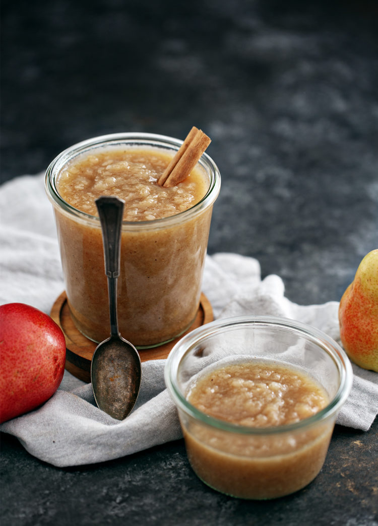 jars of pear sauce and a spoon