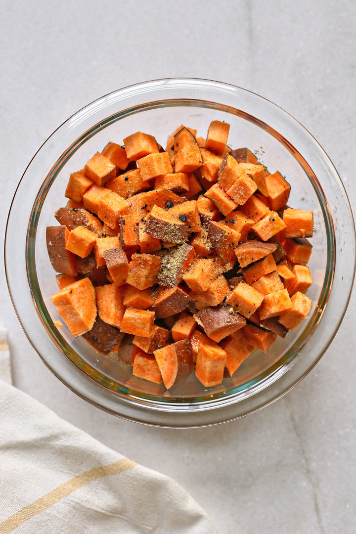 bowl of sweet potatoes for a pear and spinach salad recipe for fall
