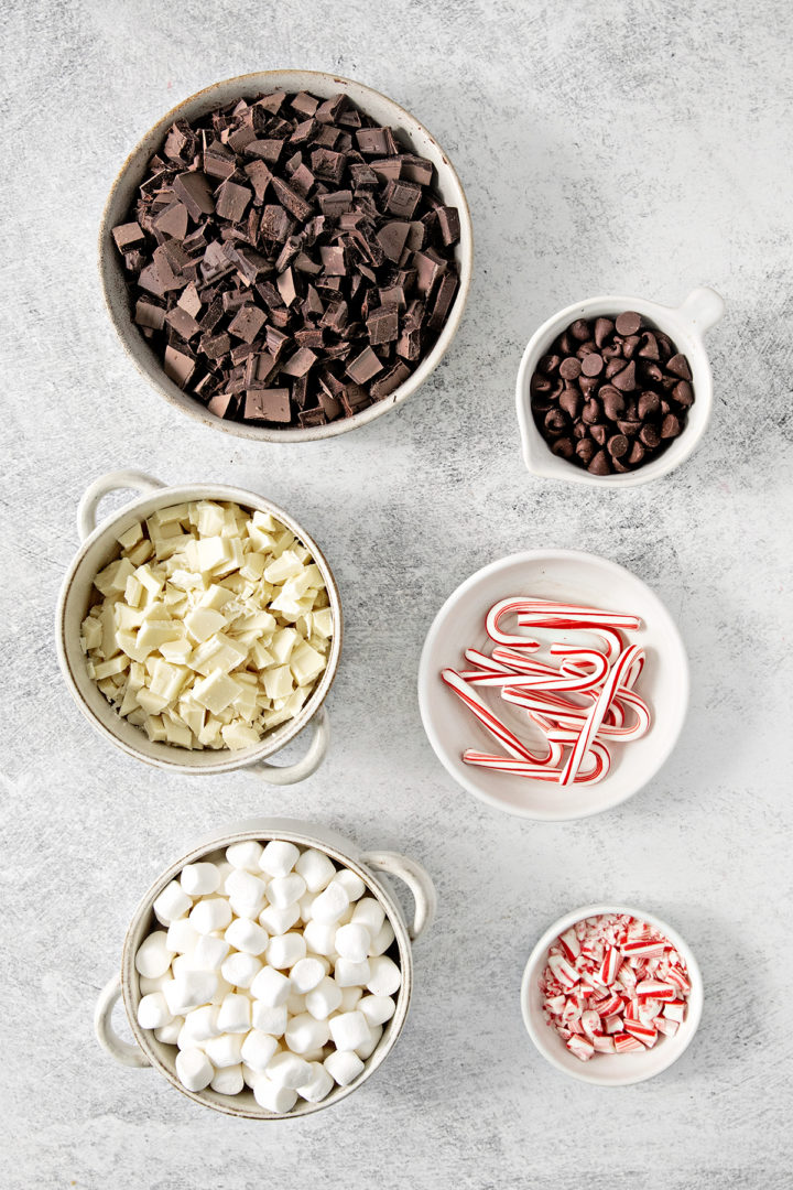 overhead photo of ingredients to make candy cane bark in bowls