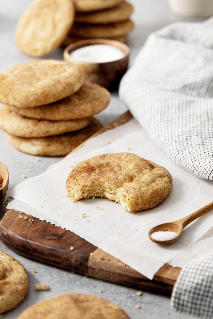 brown butter snickerdoodle cookie with a bite out of it