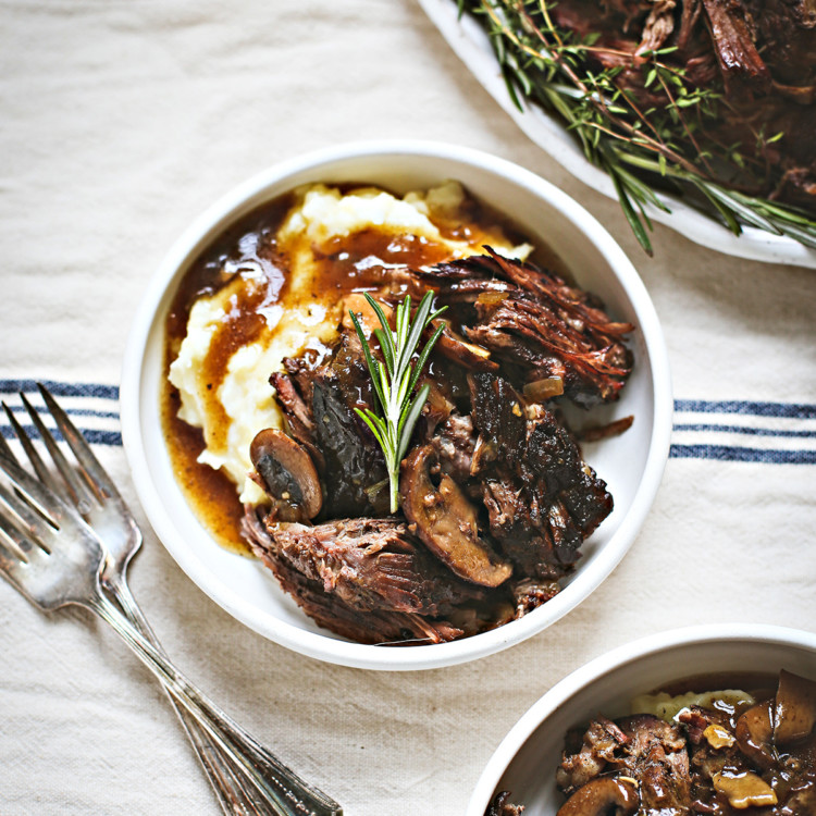 bowl of mashed potatoes and instant pot chuck roast