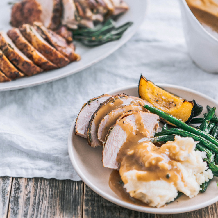 thanksgiving dinner set on a wooden table