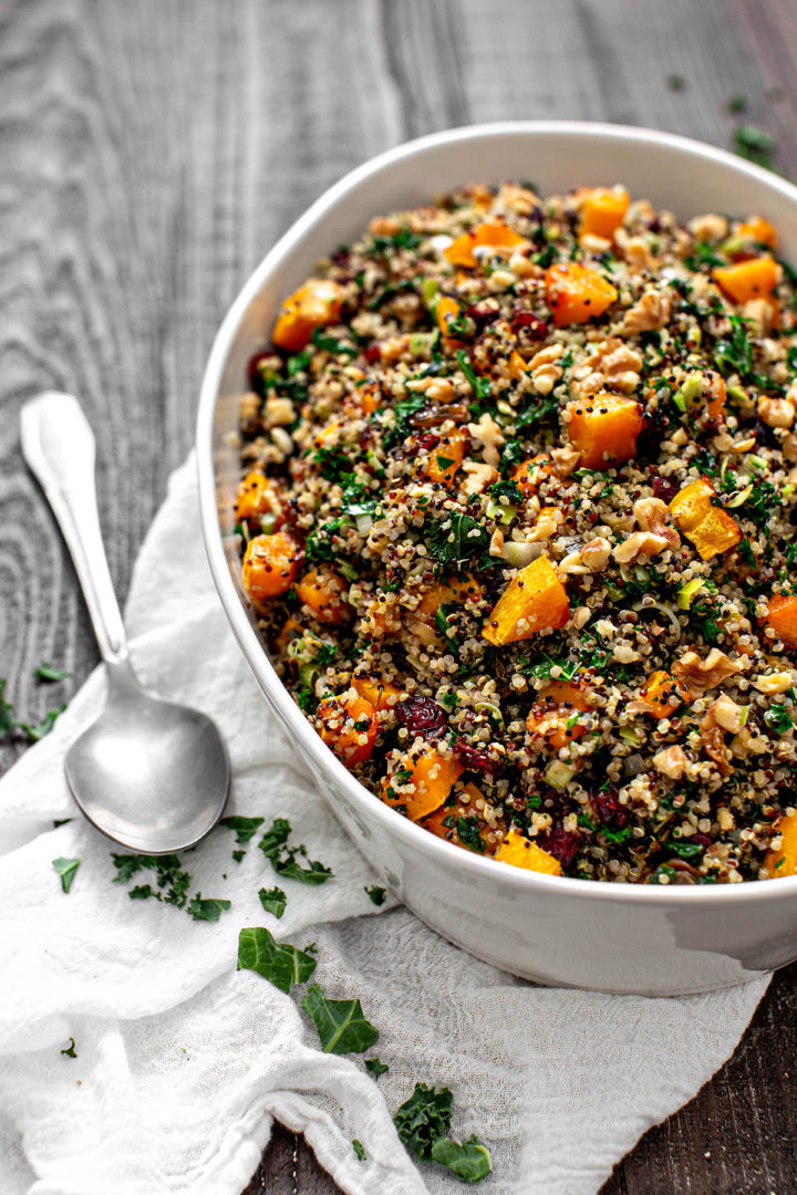white casserole dish of gluten-free stuffing made from butternut squash with quinoa