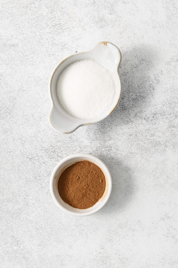 cinnamon and sugar in bowls for snickerdoodle cookies topping