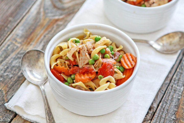 two bowls filled with slow cooker chicken and noodles	