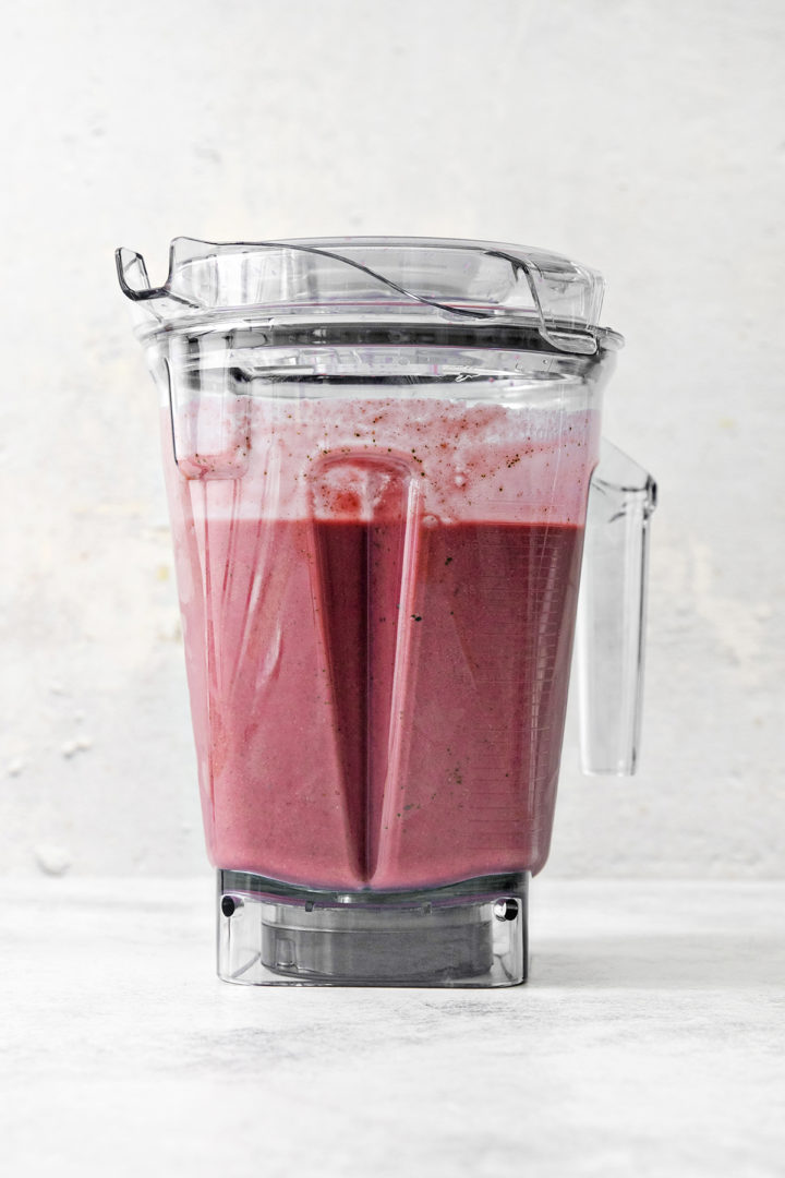 raspberry banana smoothie in a blender