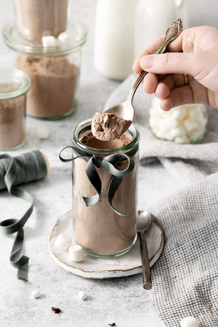 a jar of hot cocoa mix with powdered milk