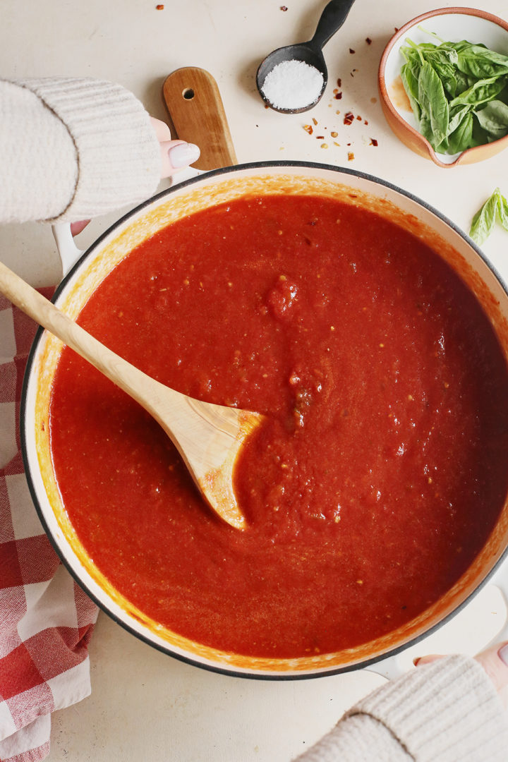 woman cooking easy vodka sauce