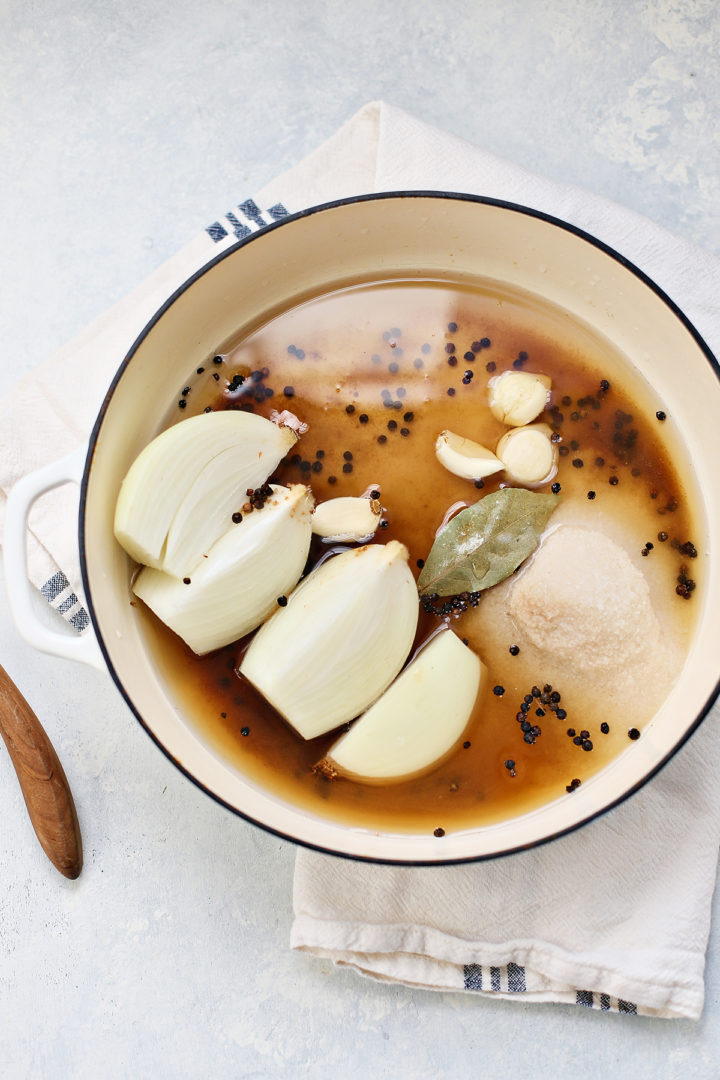 preparing pork shoulder brine in a pot