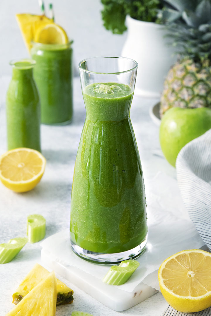 a carafe of kale pineapple smoothie