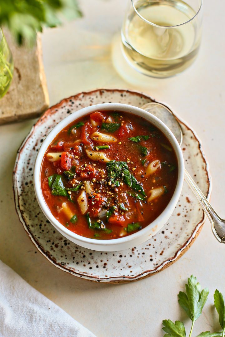 bowl of tomato pasta soup on a plate