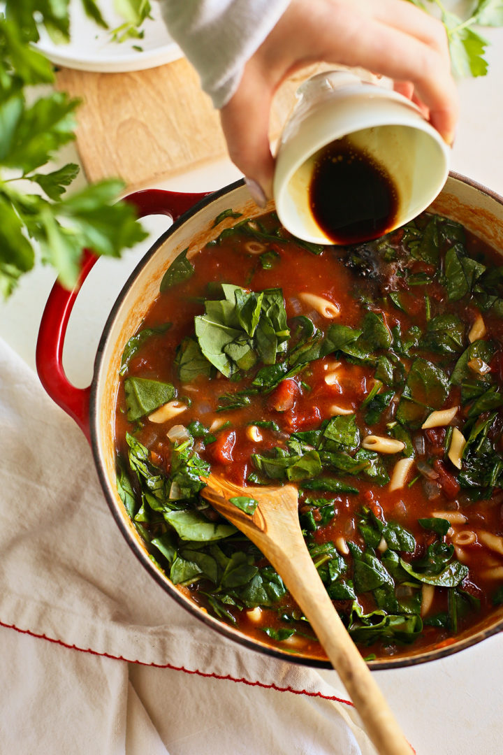 adding balsamic to tomato spinach soup