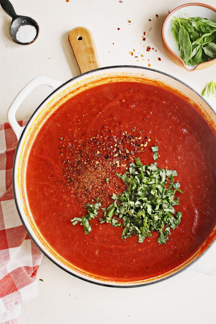 a pan of simple vodka sauce with fresh basil