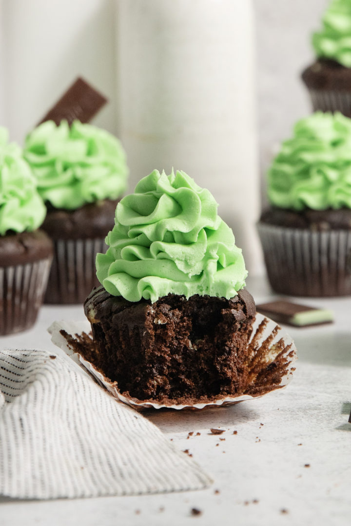 chocolate mint cupcake with a bite out of it