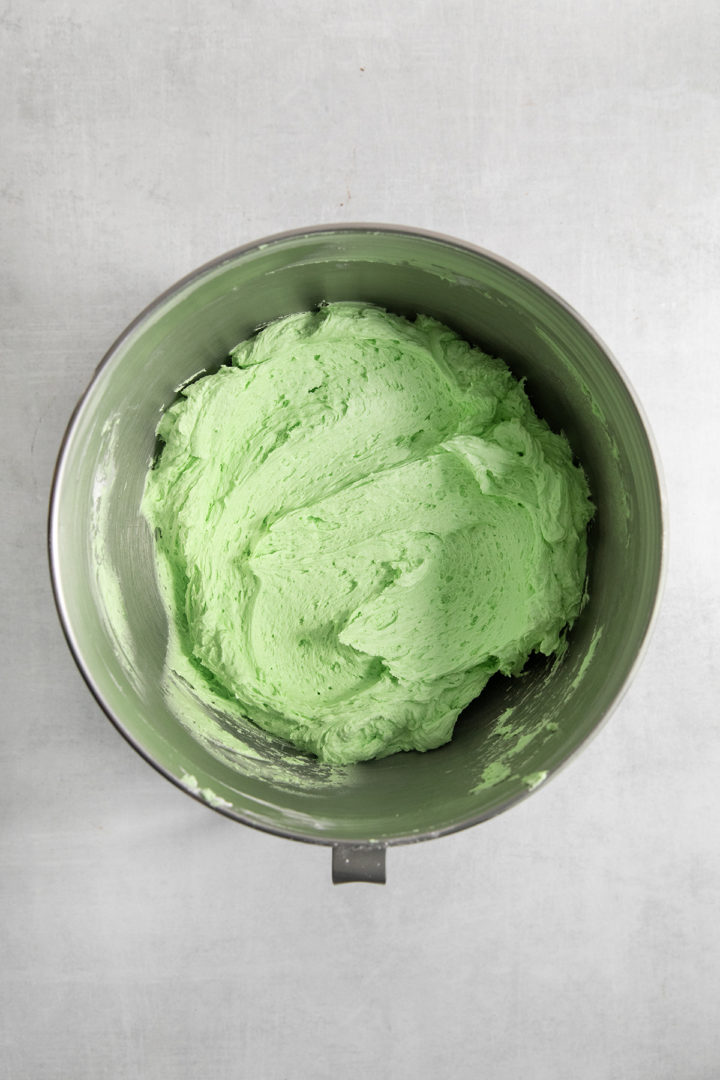mint buttercream frosting in a metal bowl