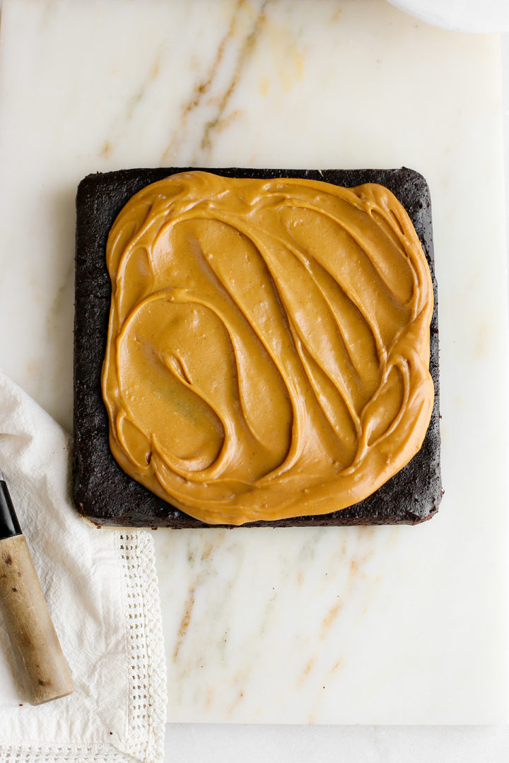 st patrick's day brownies made with guinness on a white marble board