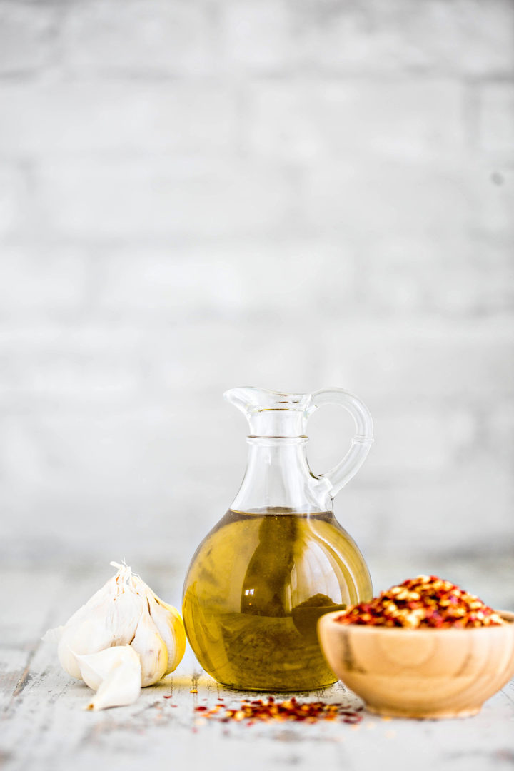 ingredients needed to make diy chili oil on a wooden table