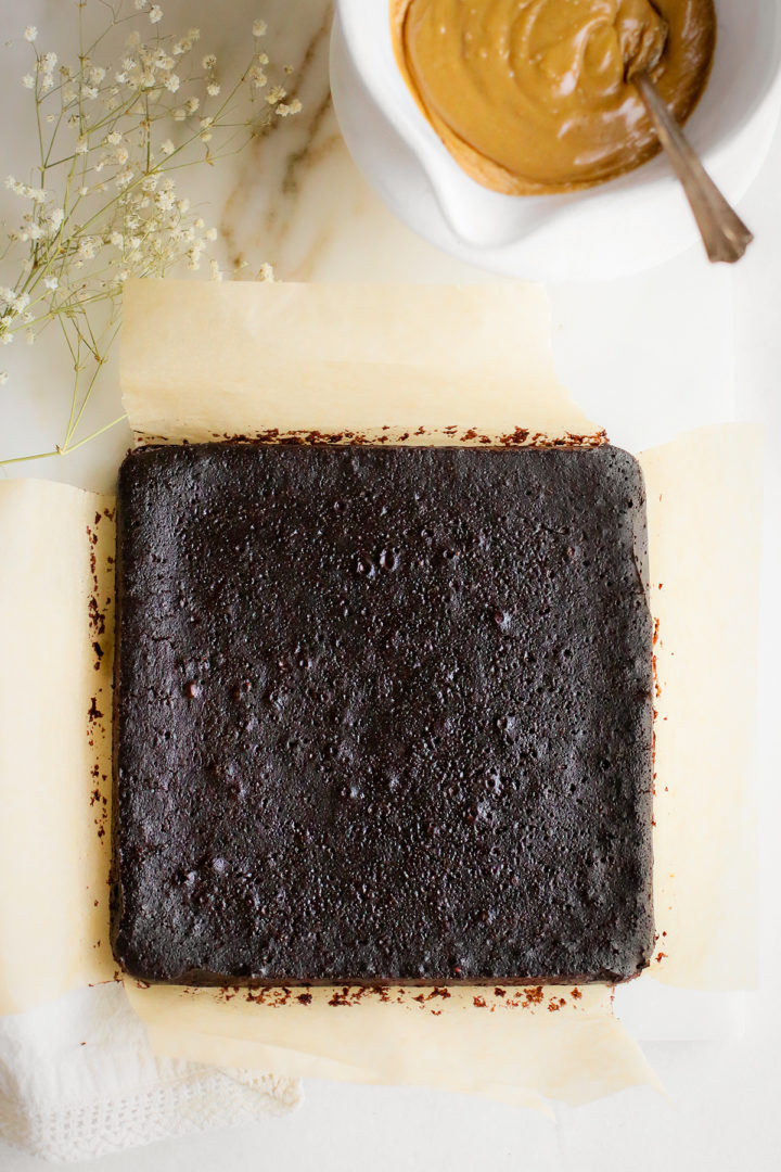 freshly baked guinness brownies on parchment paper