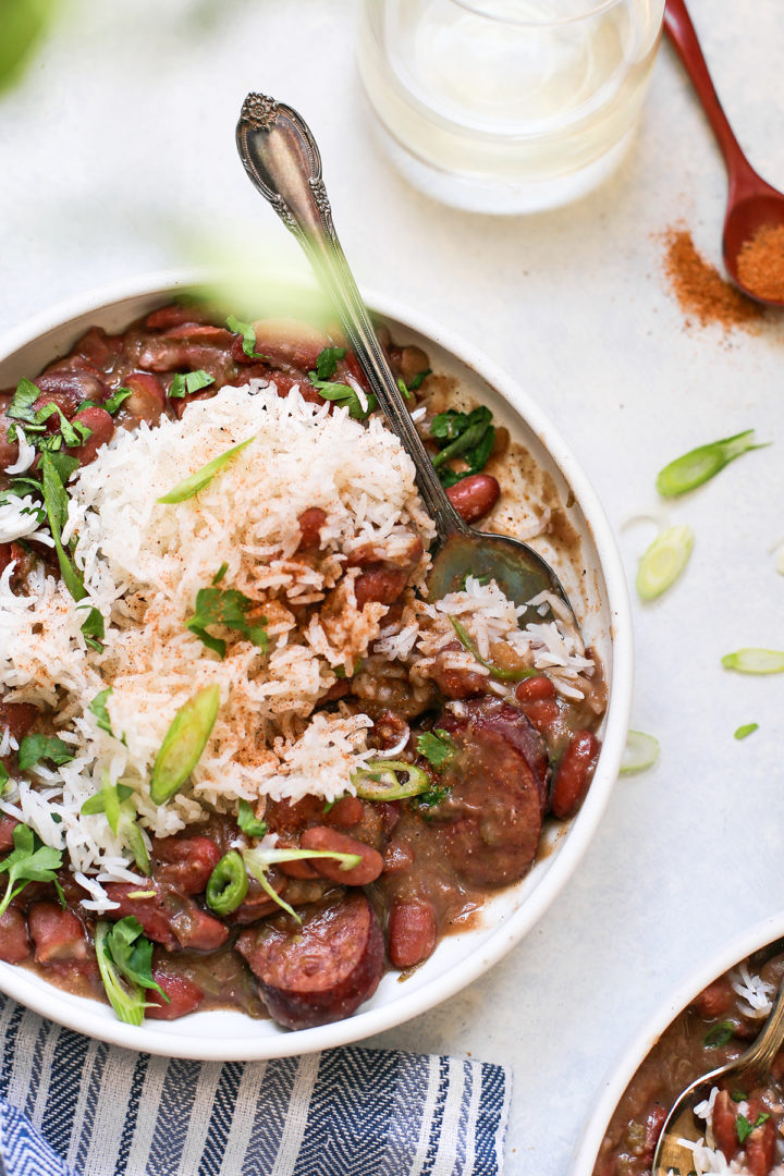 red beans and rice in a white bowl with a spoon
