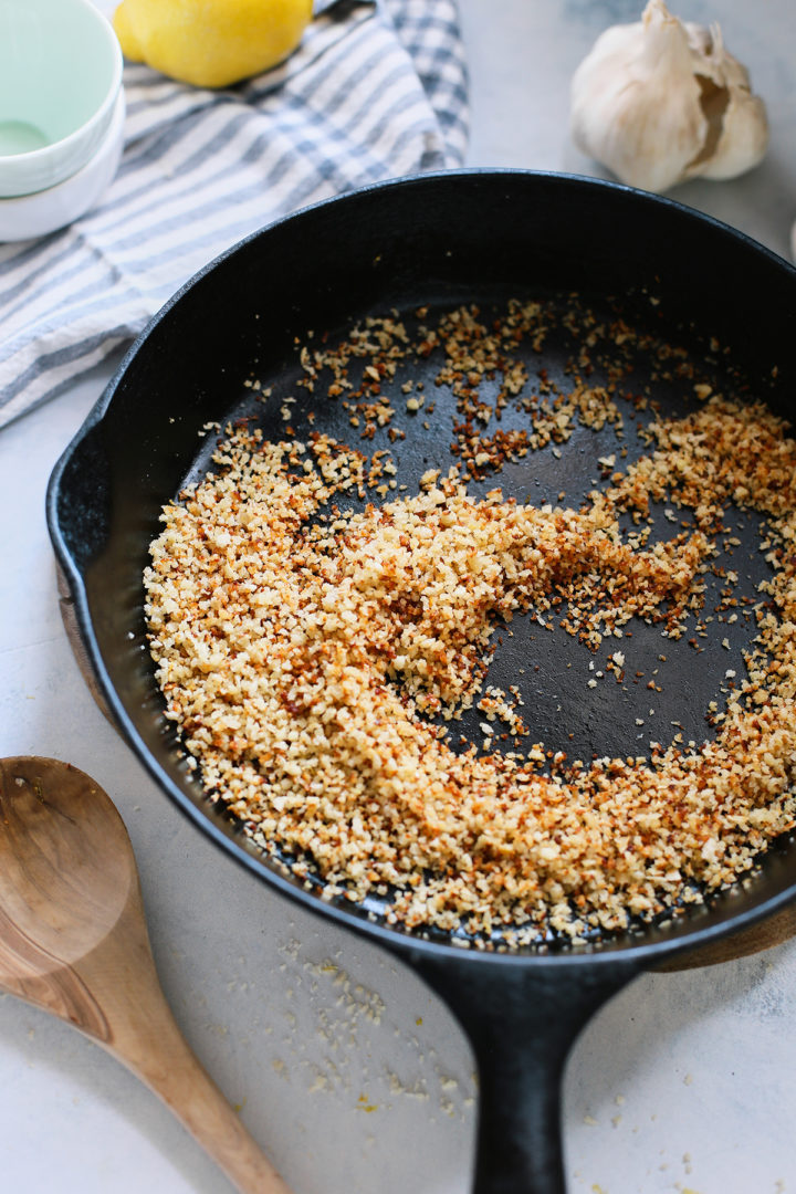 parmesan panko breadcrumb topping for traeger asparagus in a cast iron pan