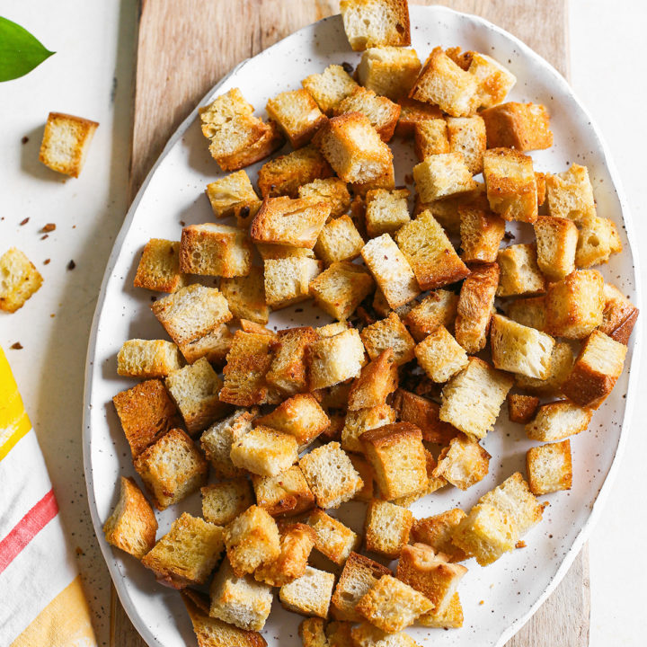 sourdough croutons on a white platter